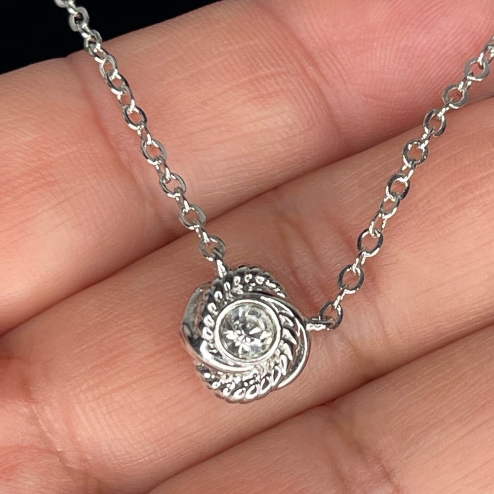 Kate Spade Infinity and Beyond Silver Tone Rhinestone Knot Pendant Necklace - Picture 7 of 12